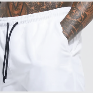 กางเกงวิ่งออกกำลังกายผู้ชายเอวยางยืดคุณภาพสูงพร้อมโลโก้สั่งทำพิเศษ ระบายอากาศได้ดี - Product Image 1