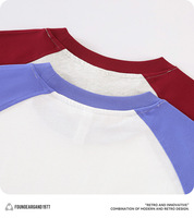 Kaos Raglan Lengan Panjang Pria 235G Katun Murni Warna-Blok Unisex Gaya Amerika Fit Longgar Patchwork