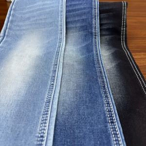 Tissu en denim extensible tissé en sergé gris bleu Lizhi pour garçons et filles, couleur personnalisée, coton/polyester/spandex - Product Image 1