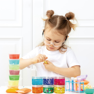 Jouet éducatif : Slime transparent décoratif en bouteille torsadée, prix usine de gros, slime cristallin avec breloques - Product Image 6