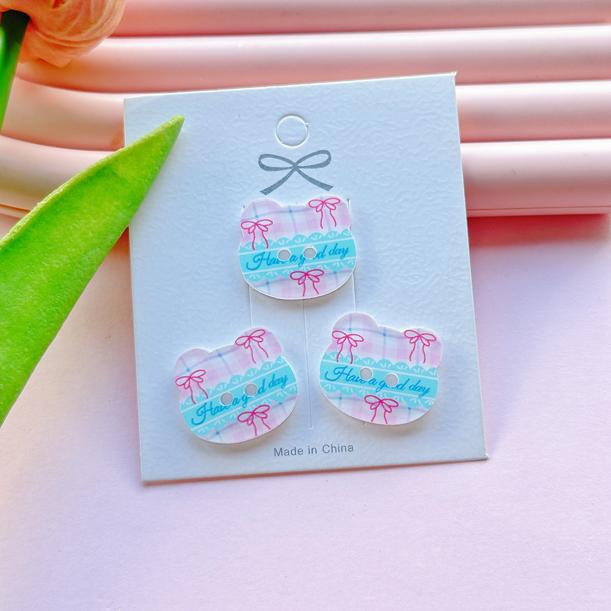Bouton bleu rose 22*19mm