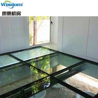 Sala de exposición suelo elevado de vidrio transparente