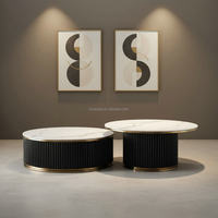 Table basse moderne avec plateau en pierre frittée, cadre en bois noir et acier inoxydable doré pour salon, avec rangement