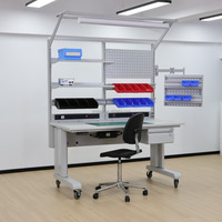 Banc de travail ESD à hauteur réglable électriquement, conçu pour l'assemblage de circuits imprimés, avec configuration flexible pour un assemblage de précision