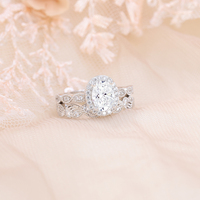 Vente en gros de bijoux de luxe à la mode 1.5 carats bagues en moissanite à coupe ovale avec bande torsadée pour femmes, fiançailles de mariage