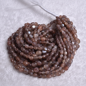 Cuentas ovaladas de piedra lunar de Chocolate de calidad AAA, piedras preciosas semipreciosas para la fabricación de joyas, lotes a granel al por mayor - Product Image 1