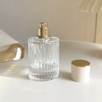 Flacon de parfum en verre transparent OEM 30ml 50ml, cylindre vide, luxe, noir mat, couvercle magnétique, boîte cadeau, vaporisateur à pompe, emballage