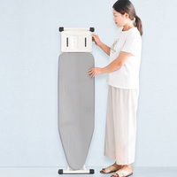 Table à repasser commerciale rotative en acier inoxydable pour hôtel, pliable, avec aspiration à vapeur et rangement intégré