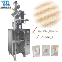 Machine d'emballage automatique pour sachets à trois soudures avec alimentation par aspiration et pince de tirage pour granulés, noix et miettes