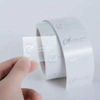 Rouleau d'autocollant d'étiquette de bouteille transparent avec impression personnalisée vinyle imperméable pour soins de la peau feuille d'or logo estampillé autocollant en vinyle