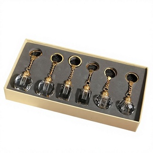 Porte-clés parfumé de haute qualité, longue durée, doré et noir, mini-parfum, porte-clés parfumé - Product Image 1