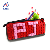 Pochette en toile à fermeture éclair triangulaire DIY à faible MOQ, étui à crayons avec bloc de puzzle en silicone mural