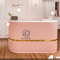 Comptoir de caisse rose haut de gamme de luxe petite entreprise hôtel magasin de vêtements réception salon de manucure réception