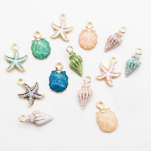 Venta al por mayor Concha estrella de mar Concha aleación colgantes encantos para DIY hecho a mano pulsera pendientes collares fabricación de joyas - Product Image 1