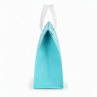Sacs d'emballage cadeau personnalisables en tissu non tissé réutilisable, écologiques et durables, avec poignées, fabriqués en Chine, vente chaude en usine