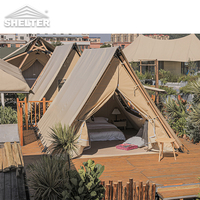 Tente de luxe pour hôtel de glamping en plein air, design triangulaire, villa préfabriquée, tente de safari en toile