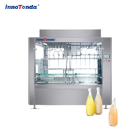 Machine de remplissage liquide linéaire à gravité en gros pour usine, remplisseuse automatique SUS304 pour eau, alcool, savon liquide