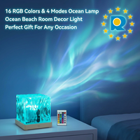 Projecteur d'ondulations aquatiques Aurora, moderne, en plastique, LED, commande tactile, alimenté par batterie, 16 couleurs, flamme rotative, salon