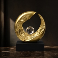 Sculpture d'onde en résine dorée avec sphère et base noire, figurine géométrique abstraite pour décoration d'étagère de salon