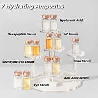 Vente en gros de 7 types de sérums multi-effets stériles à l'acide hyaluronique, hexapeptide-8, vitamine C, mucine d'escargot, ampoules booster pour le visage