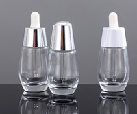 Vente en gros de flacons compte-gouttes en verre transparent de luxe personnalisés de 30 ml et 50 ml, contenants vides pour huiles essentielles, soins de la peau, sérums
