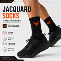 Chaussettes de sport en coton mi-mollet avec impression de logo personnalisée, respirantes et anti-odeur pour l'entraînement des équipes sportives
