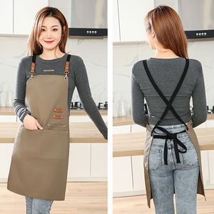 Delantal de lona para mujer, impermeable, a prueba de aceite, uniforme de trabajo para cocina, con bolsillos y correas ajustables - Product Image 1