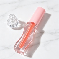 Gloss à lèvres scintillant transparent en gros avec paillettes irisées, effet repulpant longue durée pour marque privée