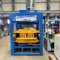 Machine de moulage de blocs entièrement automatique durable QT4-15, machine hydraulique de fabrication de briques en béton pour briqueterie moyenne