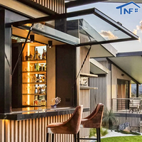 Fenêtres à auvent pliantes modernes en alliage d'aluminium à vérins à gaz pour usage commercial en restaurant, avec persiennes extérieures et passage intégré