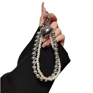 CHENXI – Nouvelle breloque de téléphone en alliage pour femme, motif cœur, perles argentées, accessoires Y2K, porte-clés, bracelet de poignet - Product Image 1