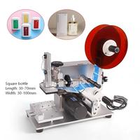 Machine d'étiquetage semi-automatique DMX pour bouteilles plates carrées, boîtes et cartons