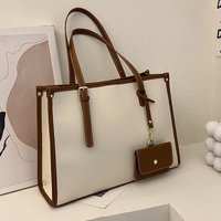 Sac à main tendance grande capacité avec coutures apparentes, sac à bandoulière simple pour le shopping, collection été 2026, couleur unie, vente en gros