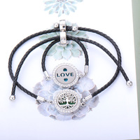 Mode peut ouvrir le bracelet de diffuseur d'huile essentielle en cuir de diamant Pu taille réglable fleur coeur motif bracelet de diffuseur