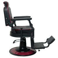Sillón de Barbería Moderno con Costuras Rojas, Reposacabezas Ajustable y Marco Metálico Negro Decorativo para Salón de Belleza Masculino de Alta Gama