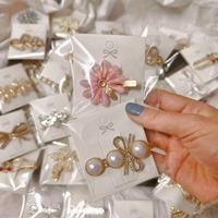 100 pinces à cheveux élégantes en métal avec strass de luxe pour filles, design aléatoire, accessoires de mode en gros de Yiwu