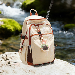 Sac à dos imperméable beige grande capacité en nylon avec pendentif ours, décontracté, pour femme, adolescente, voyage, école, unisexe, sac quotidien - Product Image 1