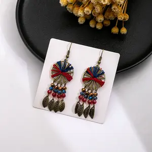 Châu Âu và mỹ Retro Bohemian phong cách quốc gia Bông tai qua biên giới dệt cổ màu vòng hạt dài rìa tai móc