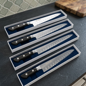 Cuchillo de chef de acero inoxidable Seki Japan con mango de plástico, borde serrado, diseño ambidiestro y hoja con diseño de hoyuelos. - Product Image 2