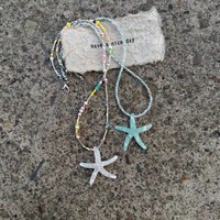 Meetyoo Vente en gros Tendance Étoile de mer Été Plage Coloré Perlé Collier ras du cou Doux Cool Couches Chaînes en plastique Bijoux pour femmes