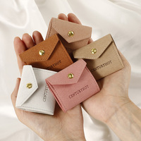 Logo personnalisé Portable Pliant Mini Bijoux Sac De Rangement De Mode Petit Rouleau Sac pour Boucles D'oreilles Collier Anneau Bijoux