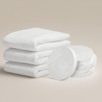 Serviettes de bain compressées jetables en non-tissé écologiques, douces et pratiques pour l'hôtellerie