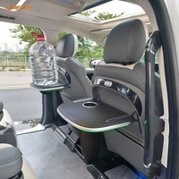 Meja Lipat Elektrik Carnival Sienna dengan Interior yang Ditingkatkan, Lampu Ambient, Sandaran Kursi Depan, dan Papan Meja Mobil