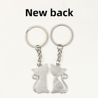 Petit cadeau créatif chat noir et blanc pendentif de sac porte-clés en métal décoration en alliage de zinc porte-clés en gros