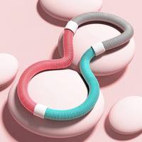 Anneau d'exercice pliable lesté en PVC et acier allié avec ressorts souples pour le soutien lombaire doux, idéal pour sculpter la taille et l'abdomen des femmes