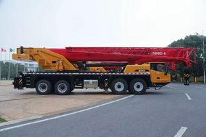 Grúa de Camión Amarilla Usada STC1000C5-8, Capacidad de Elevación Hidráulica de 100 Toneladas, Altura Máxima de 25 m, Alto Momento de Carga, para Construcción - Product Image 3