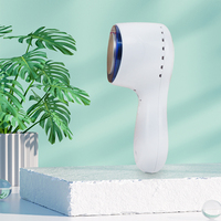 Masajeador Facial portátil, terapia con martillo frío, venta al por mayor