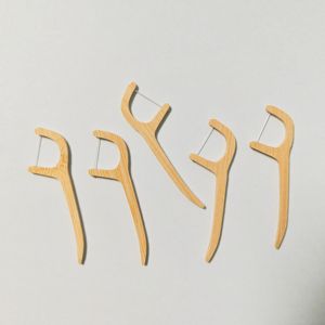 Dents parfaites et propres <span class=keywords><strong>Fil</strong></span> <span class=keywords><strong>dentaire</strong></span> en bambou <span class=keywords><strong>Manche</strong></span> en bambou durable <span class=keywords><strong>Fil</strong></span> en nylon sans BPA Écologique ne blesse pas les gencives pour tous les âges - Product Image 1