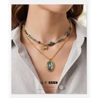 Collier long en coquille d'ormeau de style européen-américain, luxe léger de niche, sensation haut de gamme, nacre naturelle, polyvalent, superposable