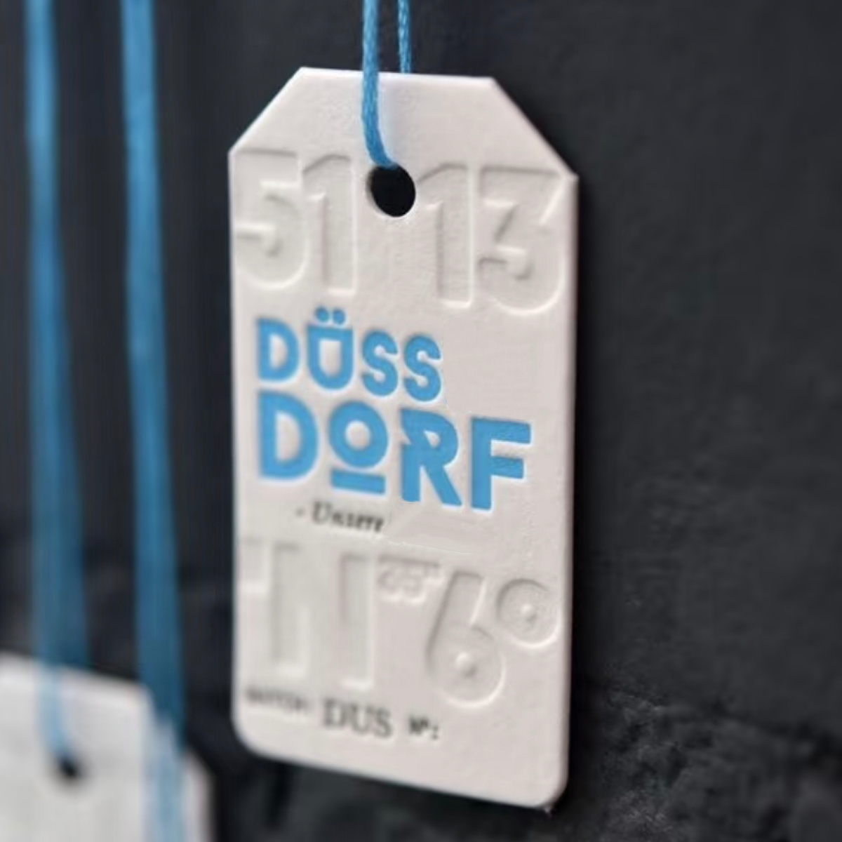 Premium Embossed Brand Hang Tag Custom Logo Tag With Bold Typography Trendy Fashion